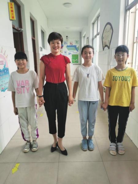 钱琳老师用爱心呵护每个学生健康成长